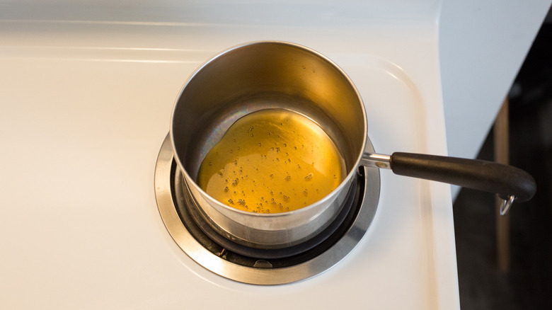 honey in small stovetop saucepan