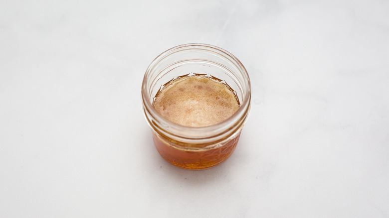 honey in small Mason jar