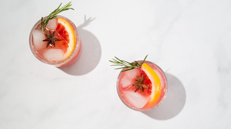 orange mocktails on marble table