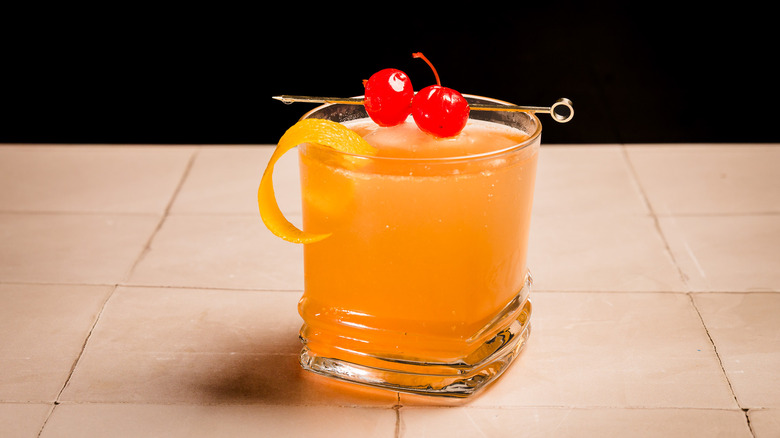 Wisconsin old fashioned on a square beige ceramic tabletop