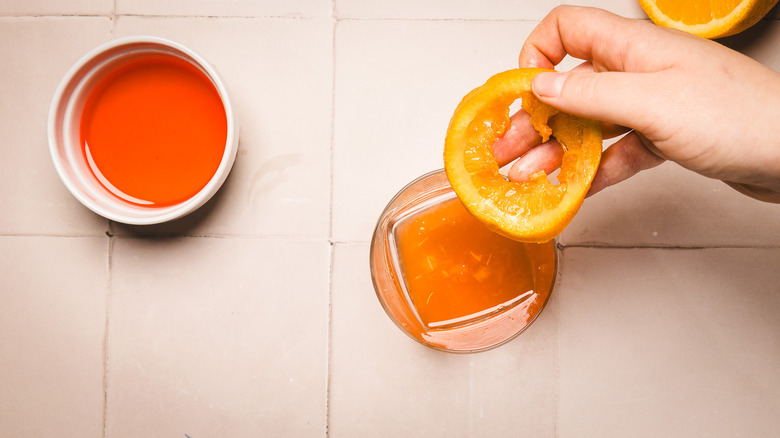 Removing orange slice