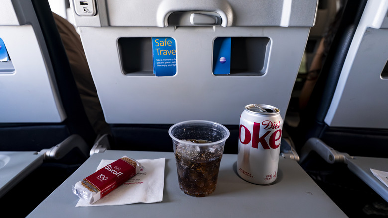 Biscoff cookies on an airplane tray table
