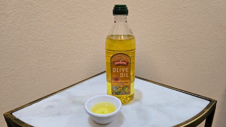 a bottle of Carlini olive oil