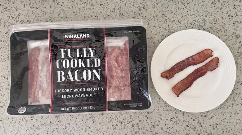 kirkland signature fully cooked bacon on white plate