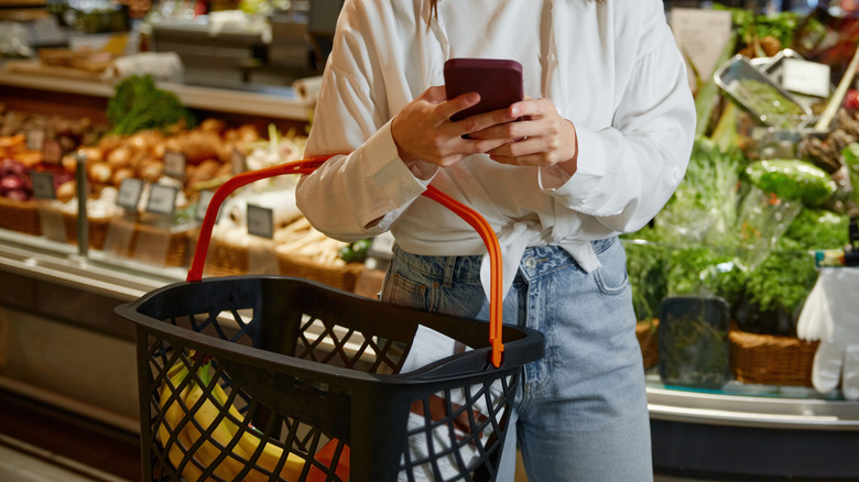 A woman shops for groceries