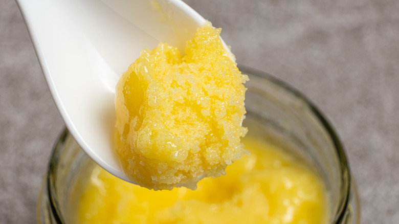 close up of ghee in a spoon