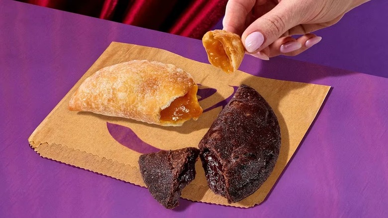 Taco Bell Chocolate Fudge and Caramel Empanadas on paper wrapping
