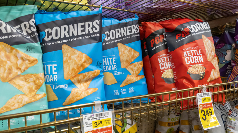 bags of different PopCorners flavors on store shelf