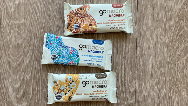 Three GoMacro bars on a table