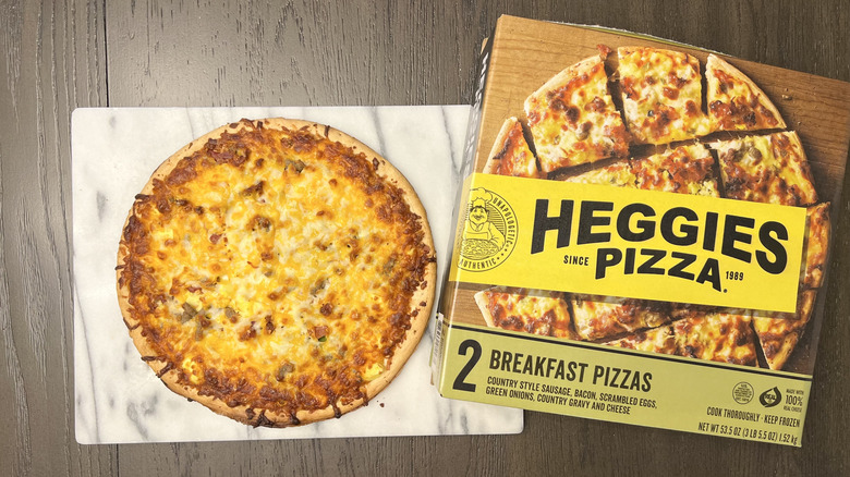 Heggies breakfast pizza on wooden surface