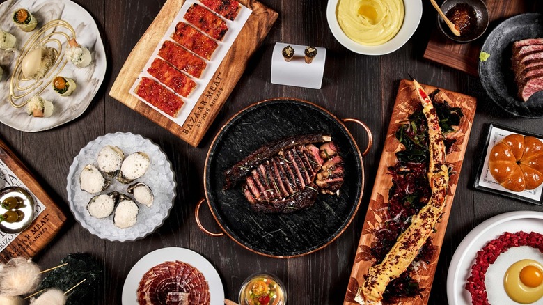 Assortment of dishes from Bazaar Meat on wooden table