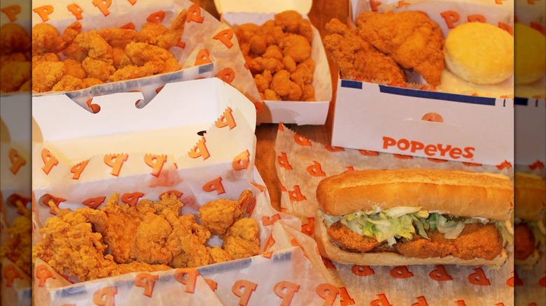 Assorted menu items from Popeyes with its po'boy fish sandwich