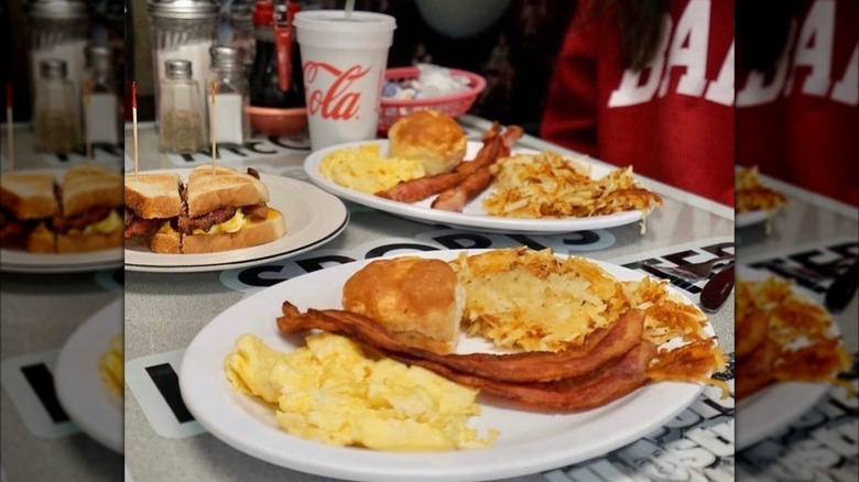 Diner table with breakfast plates