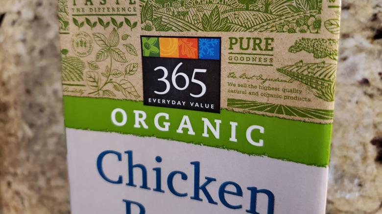 Close-up of Whole Foods' 365 brand chicken broth container