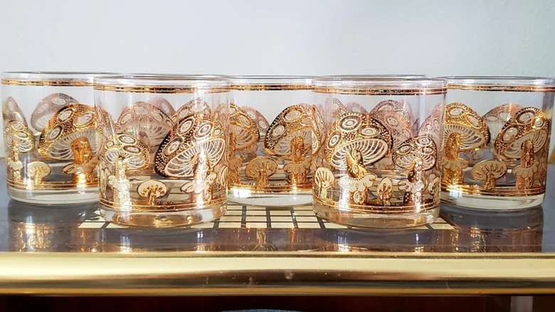 Set of mushroom-patterned Culver glasses on a shelf