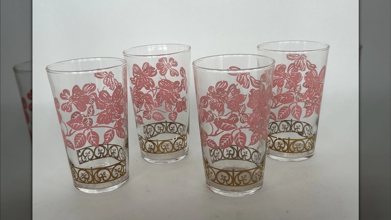 Set of Federal mid-century glasses with a pink flower pattern and gold scrollwork