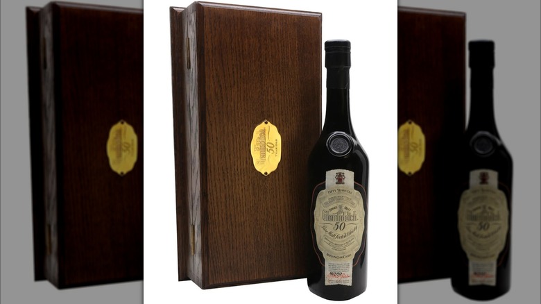 Glenfiddich 50 Year Old First Edition bottle and presentation box on a white background