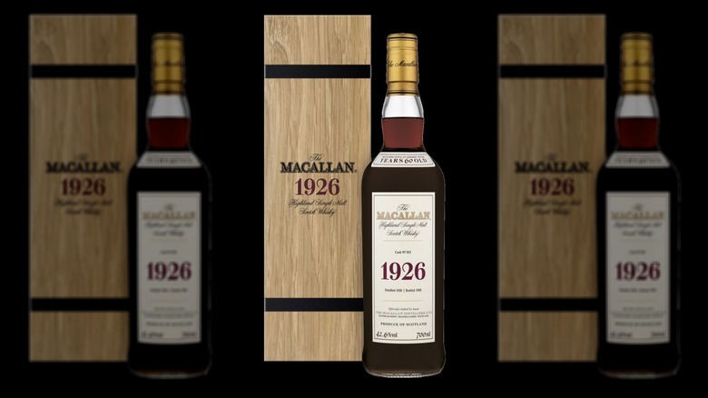The Macallan Fine & Rare 1926 bottle and box on a black background