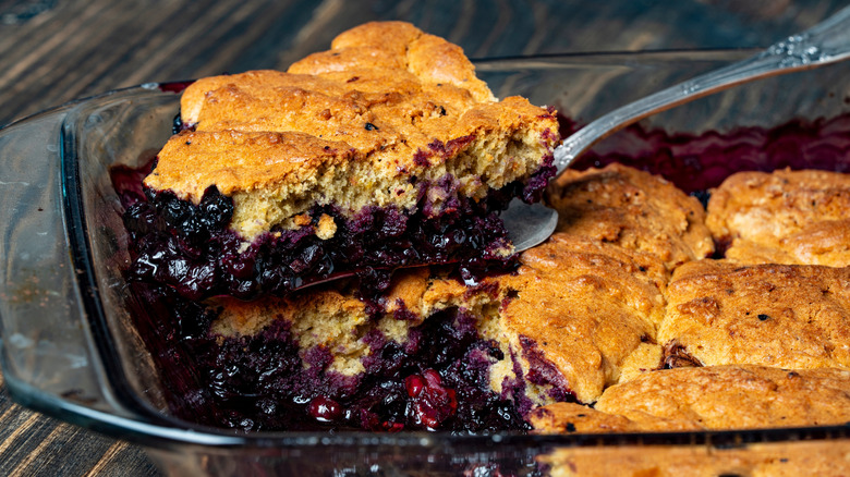 piece of blueberry cobbler on a dessert spatula