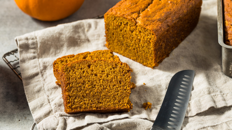 sliced pumpkin bread with knife