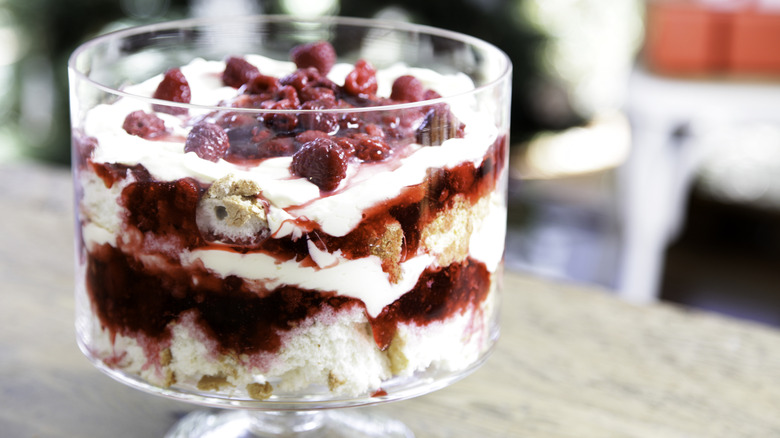 raspberry and cranberry trifle in clear glass