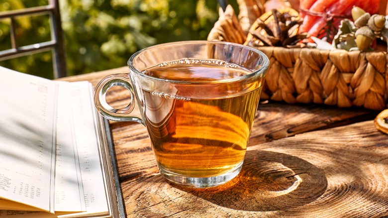 Cup of tea with a fall background