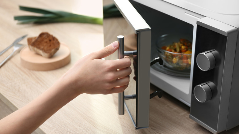 Glass container of food in the microwave