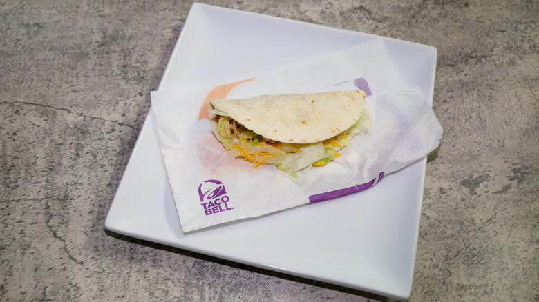 spicy potato soft taco from Taco Bell on white plate