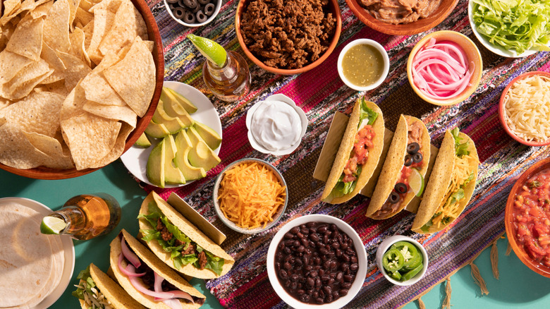 taco bar with various toppings