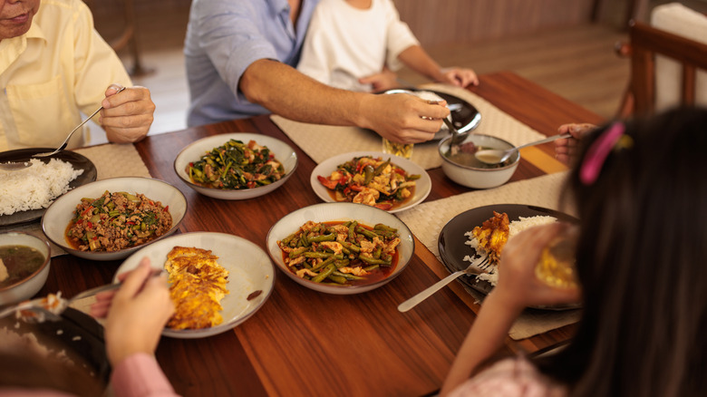 family eating spicy food