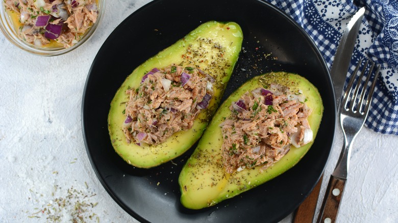 Tuna salad in avocado halves