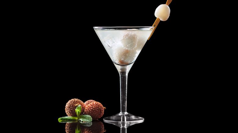 lychee martini on dark background