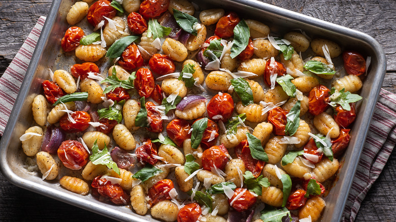 Gnocchi roasted on sheet pan with cherry tomatoes 
