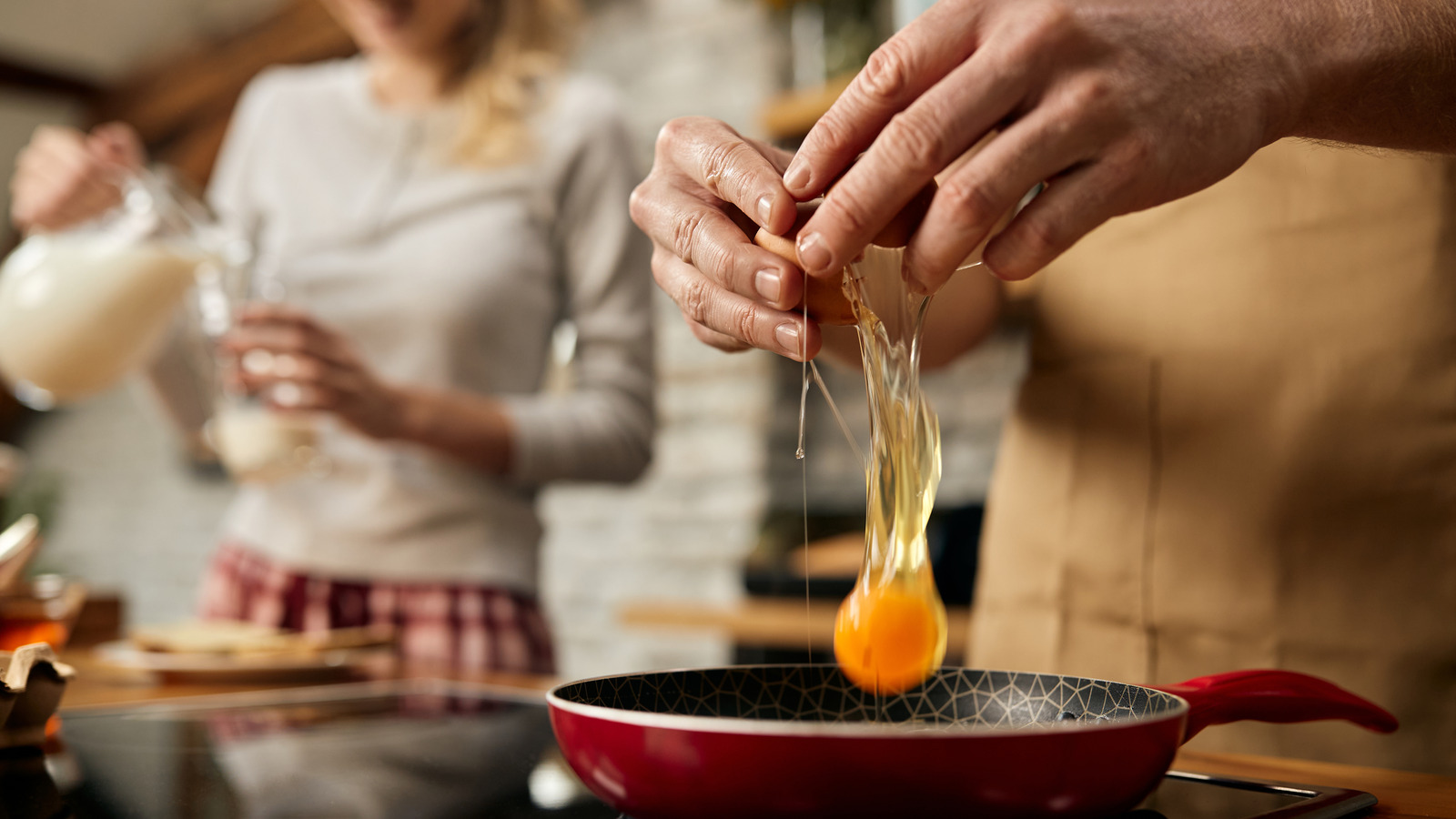 You Should Never Crack Eggs Into A Cold Pan