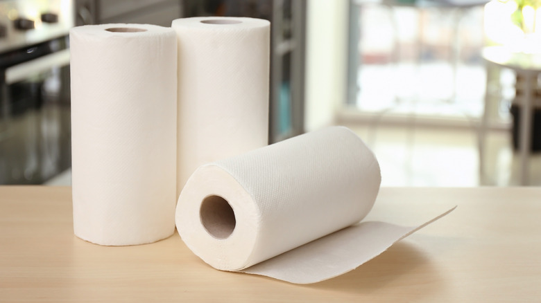 Three rolls of paper towel