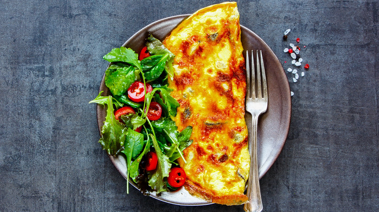 Classic egg omelet with side salad