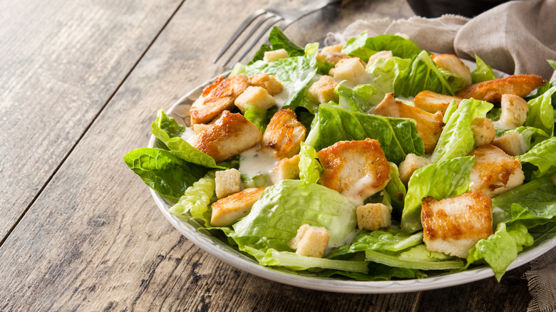 Caesar salad with fork