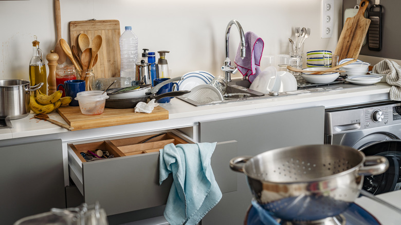 Messy kitchen with clutter on countertops