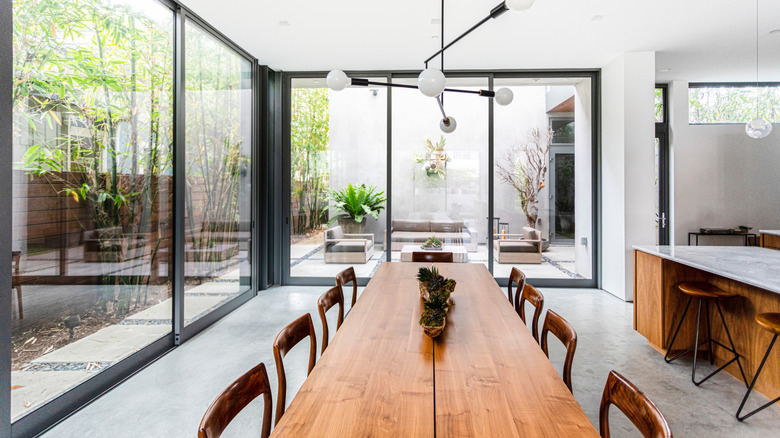 Airy dining room with wood table