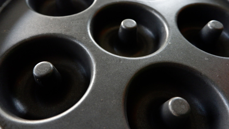 A closeup of a donut pan.