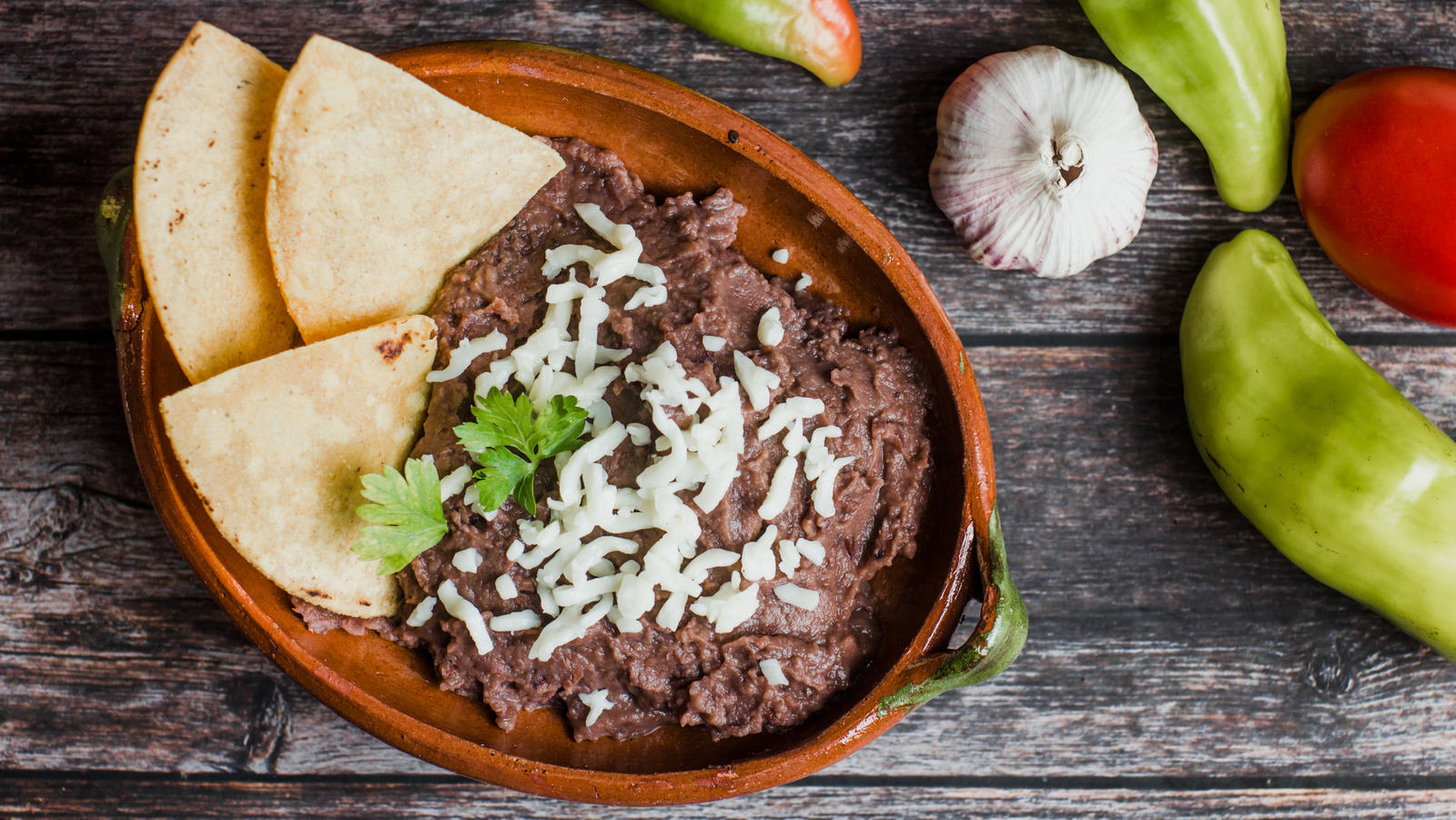 Your Leftover Bacon Fat Will Totally Upgrade Refried Beans