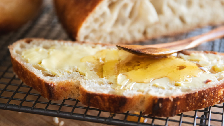 Slices of buttered sourdough bread
