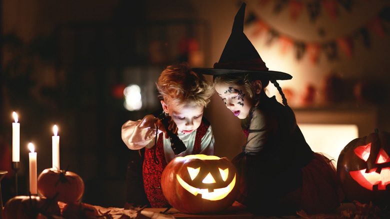 Kids in costume, Halloween table