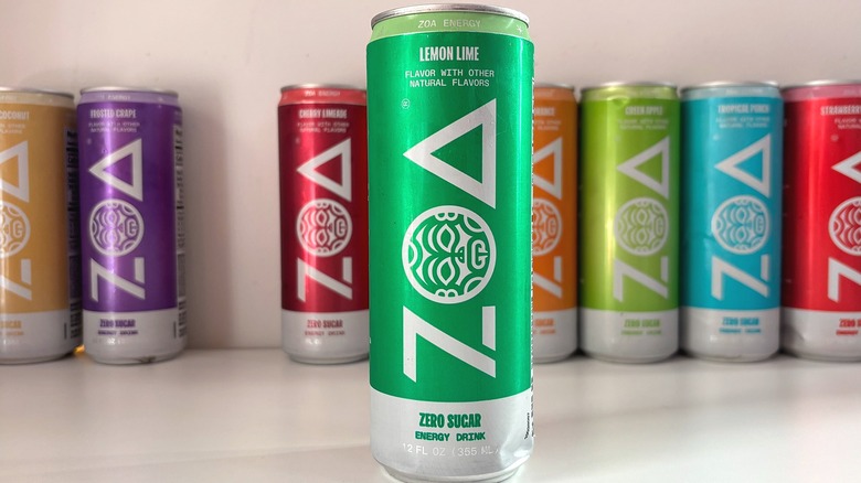 Can of Lemon Lime ZOA energy drink on white table, other cans behind